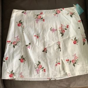 Size large white skirt with pink flowers, new with tags